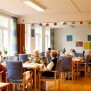 Farben schaffen eine freundliche Atmosphäre im Speisesaal